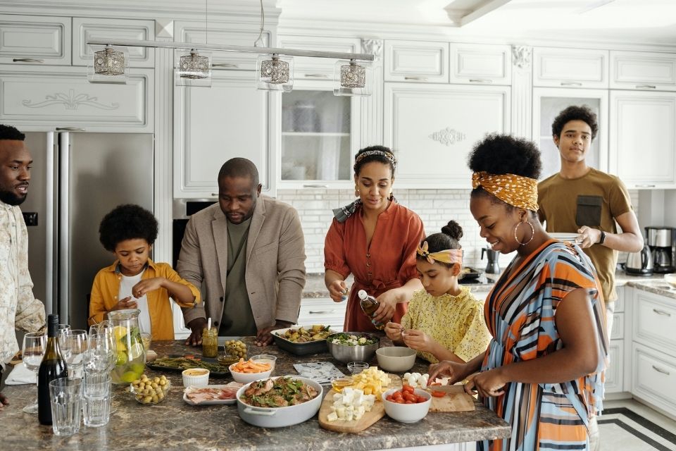 Family around an island in the kitchen